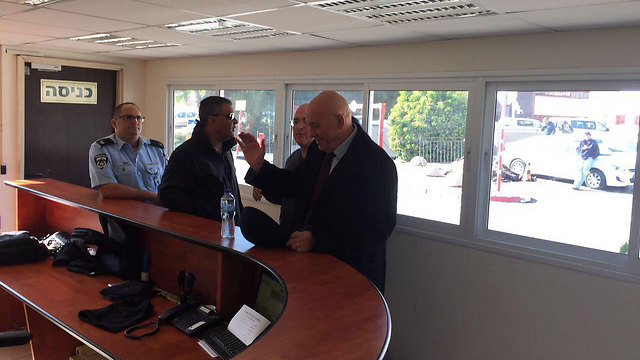 Ghattas arrives at police headquarters for questioning