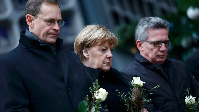 Angela Merkel remembers those killed (Photo: Reuters)