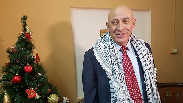 MK Ghattas at home upon being released from police custody.