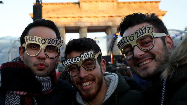 Revelers prepare to welcome 2017 in Berlin, Germany (Photo: Reuters)