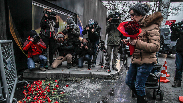 People leaving flowers outside the club (Photo: GettyImages)