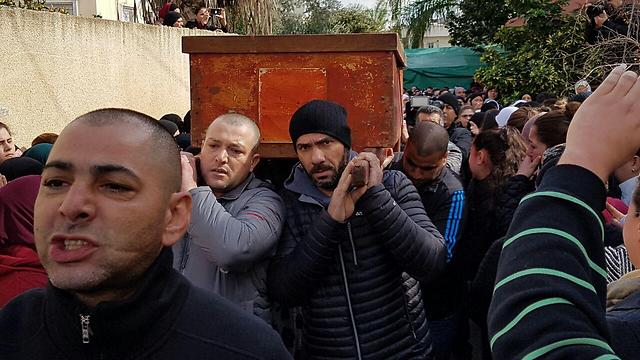 Coffin of Layan Nasser brought to a cemetery in Tira