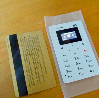 A miniature phone smuggled into jail (Photo: Israel Prison Service)