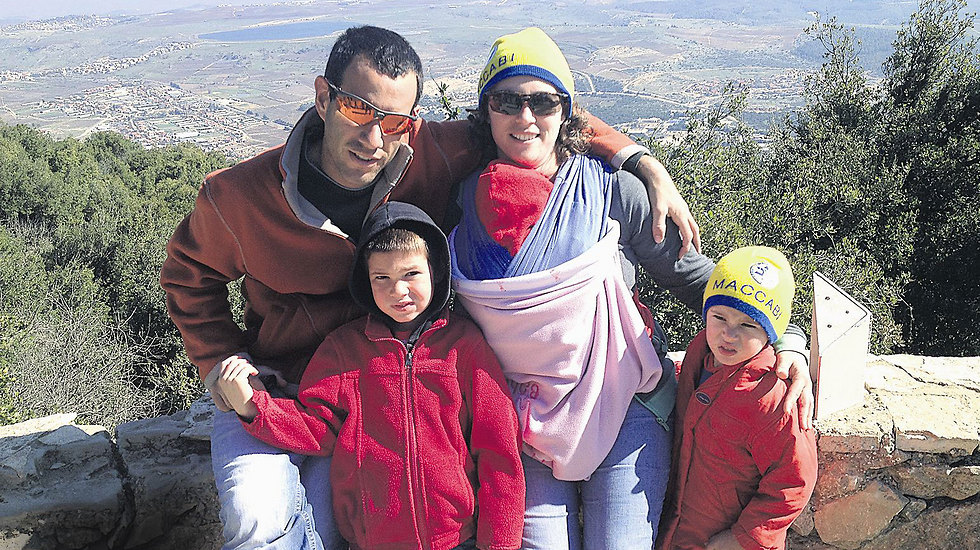 Hagai Ben-Ari with his wife and children