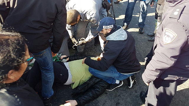 A protester being arrested (Photo: TPS)