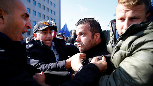 Protesters clash with police (Photo: Reuters)