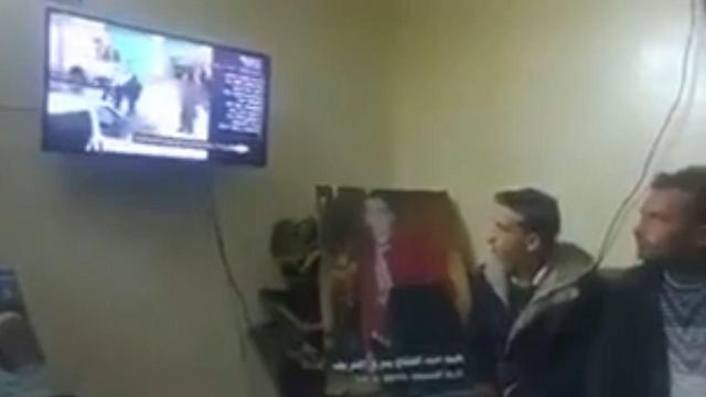 Al-Sharif's family watches a report on Azaria's conviction