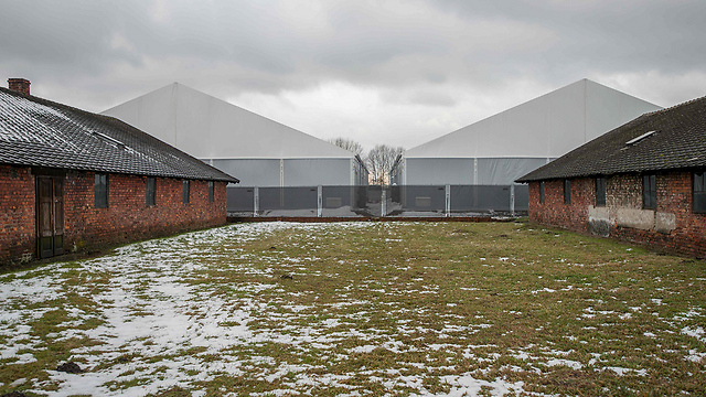 Buildings repaired under tents (Photo: AFP)