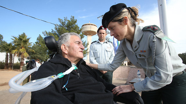 The base commander, Col. Dorit Maoz, speaks with Levy. (Photo: Elad Gershgoren)