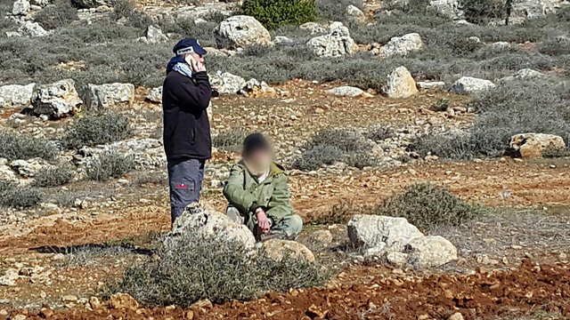 One of the suspects at the scene of the crime (Photo: Zakaria Sada)