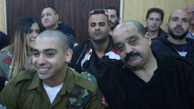 Charlie Azaria with his son Elor in court (Photo: Motti Kimchi)