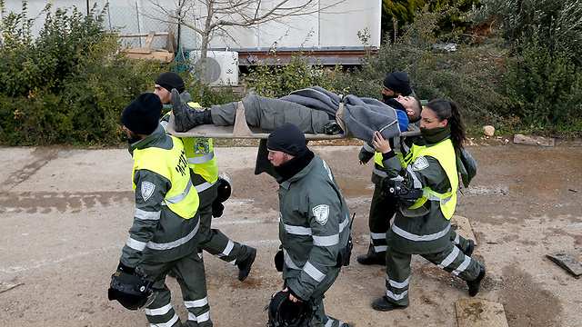 Policeman injured (Photo: Reuters)