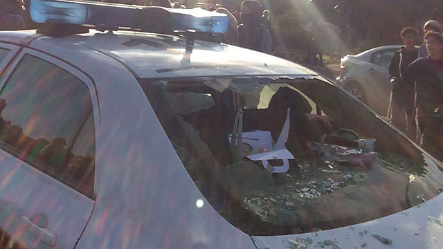 Broken windshield of a police car