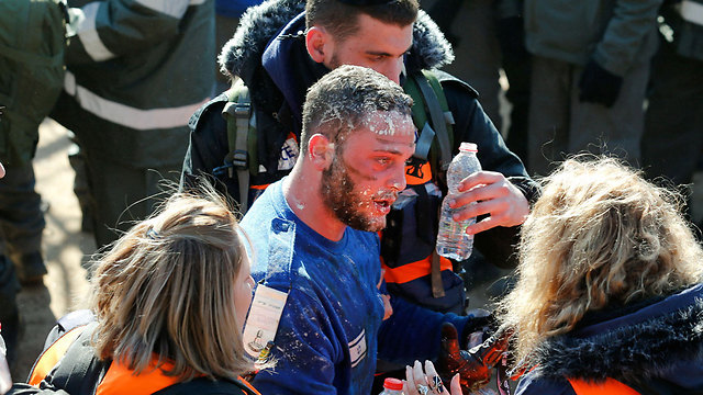 Police officer after the evacuation (Photo: Reuters)