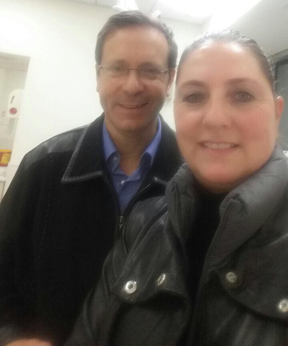 Herzog and his wife at the hospital Friday evening
