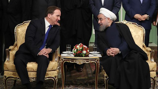 הסכם בין נשיא איראן לראש ממשלת שבדיה (צילום: AFP, HO ) (צילום: AFP, HO )