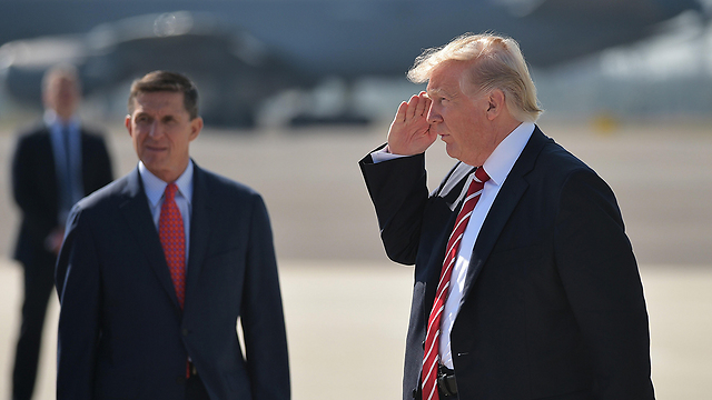 Flynn with Trump (Photo: AFP)