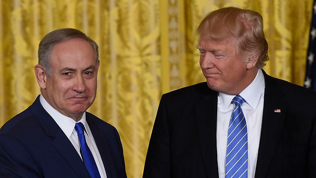 Like a couple of lovebirds: Netanyahu and Trump (Photo: AFP)