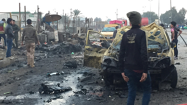 פיגוע בבגדד. דאעש מרים ראש (צילום: רויטרס) (צילום: רויטרס)