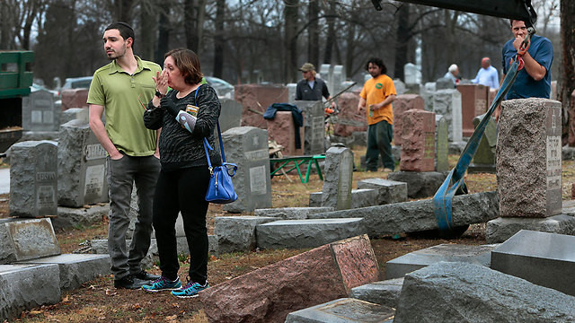 Sally Amon and her son Max at the Jewish cemetery in Saint Louis, Missouri (Photo: AP)