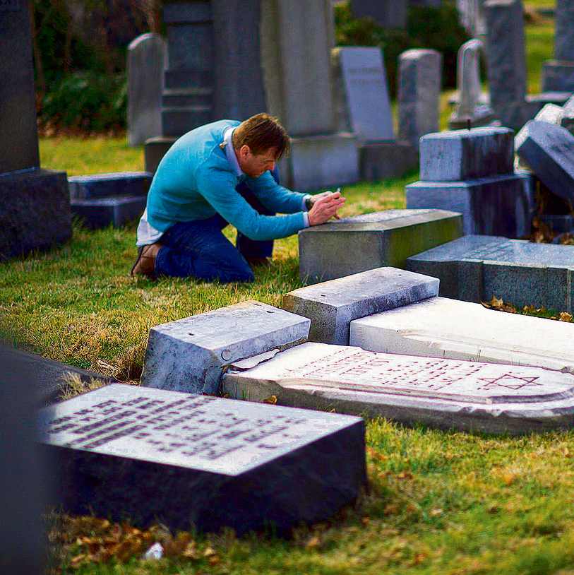 Toppled headstones in Jewish cemetery in Philadelphia (Photo: AFP)