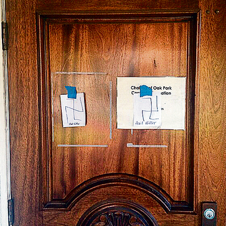 The papers taped to the synagogue door