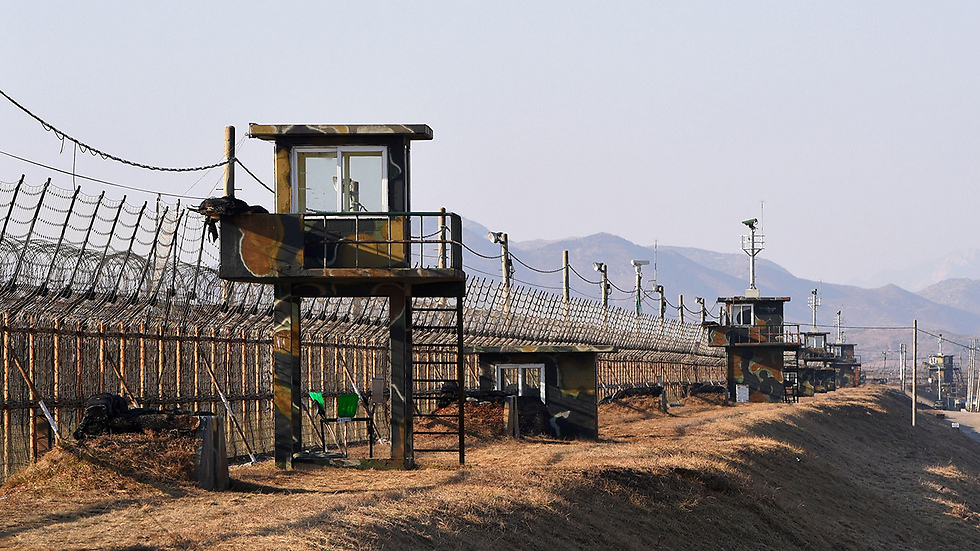 הגבול המבוצר בעולם. הגדר בין דרום קוריאה לצפון קוריאה (צילום: AFP) (צילום: AFP)
