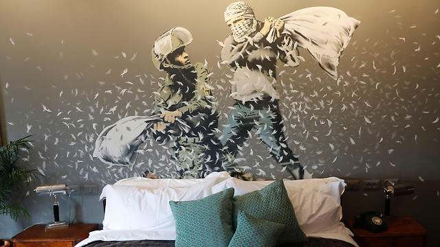 Palestinian and Israeli in pillow fight (Photo: AFP) (Photo: AFP)