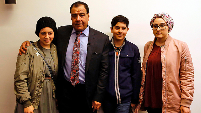 Dr. Abuelaish with members of his family (Photo: AFP)