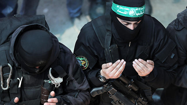 Hamas militants mourn Fukha’s death (Photo: EPA)