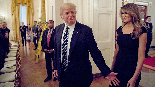Trump and wife Melania (Photo: AP)