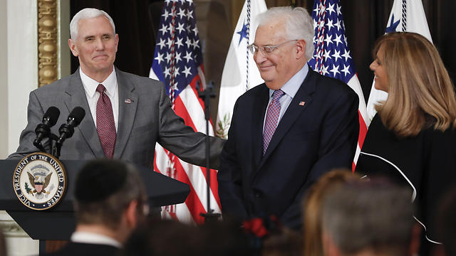 Friedman, with his family, being sworn in by Vice President Pence (Photo: AP)