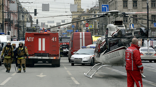 Secuirty and fire fighting teams arrive on scene (Photo: AFP)