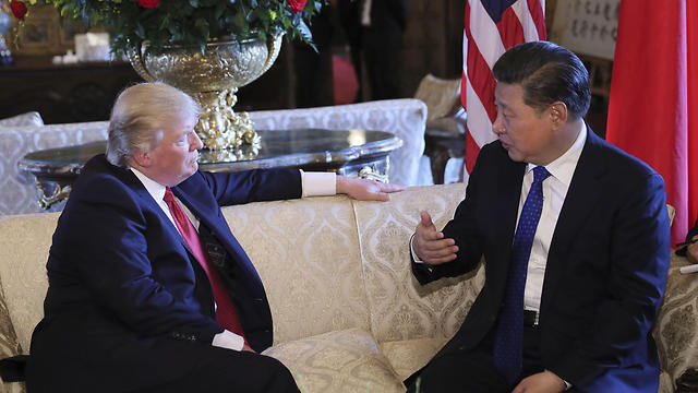 US President Donald Trump (L) and Chinese President Xi Jinping (Photo: TNS)
