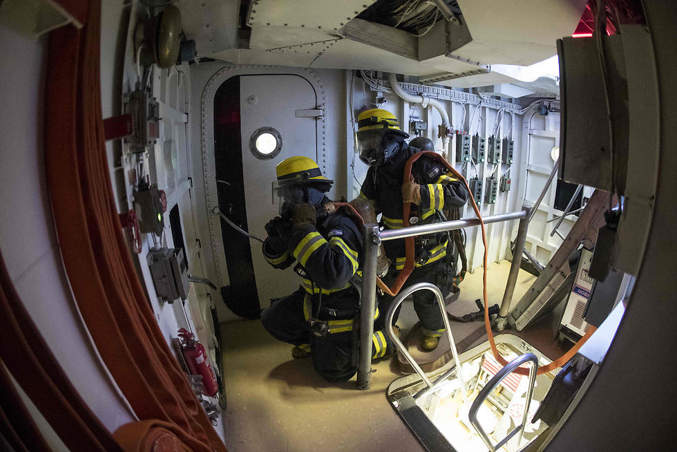 Israeli sailors onboard the INS Hanit take part in a fire evacuation exercise. (Photo: AFP)