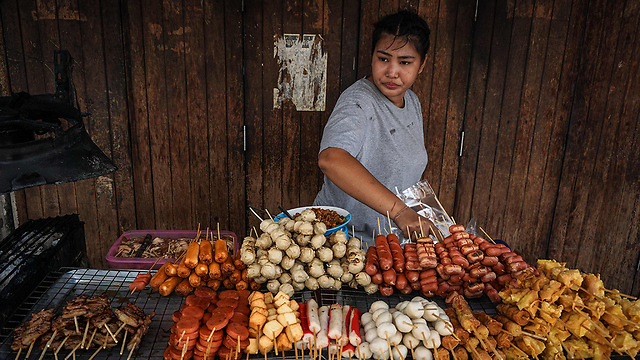 אוכל רחוב בבנגקוק. תאילנד בצמיחה (צילום: AFP) (צילום: AFP)