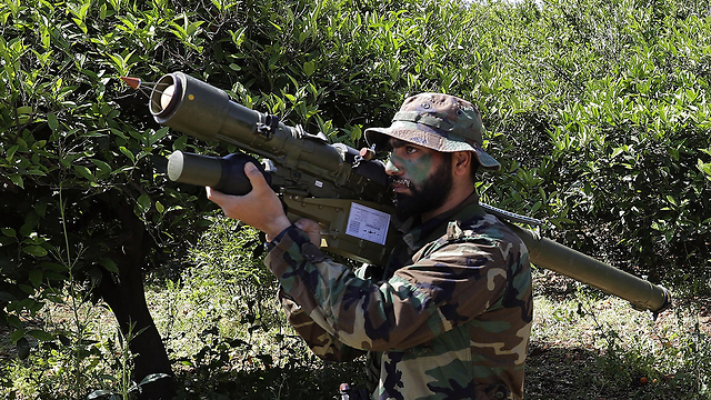 File photo of Hezbollah militant near Israel border (Photo: AFP) (Photo: AFP)