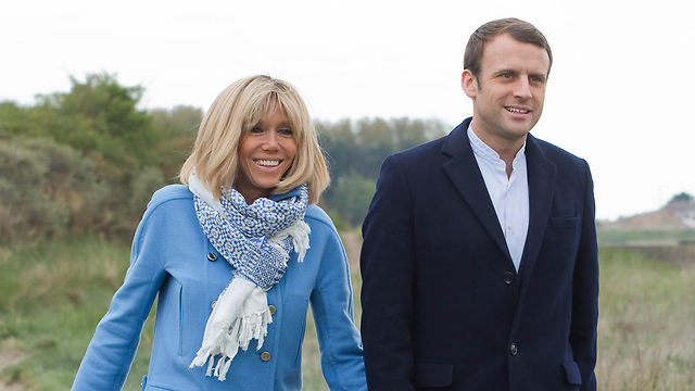 Macron with his wife, Brigitte (Photo: MCT)