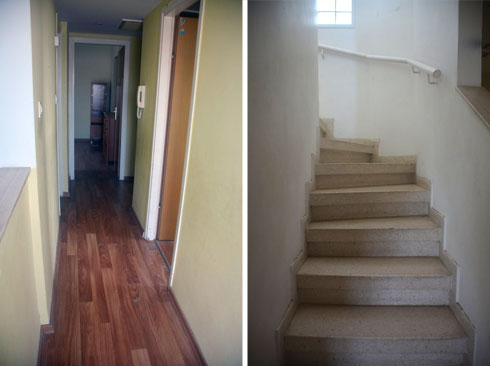 גרם המדרגות והמסדרון בקומה השנייה, לפני השיפוץ (צילום: עדי אדליס)
