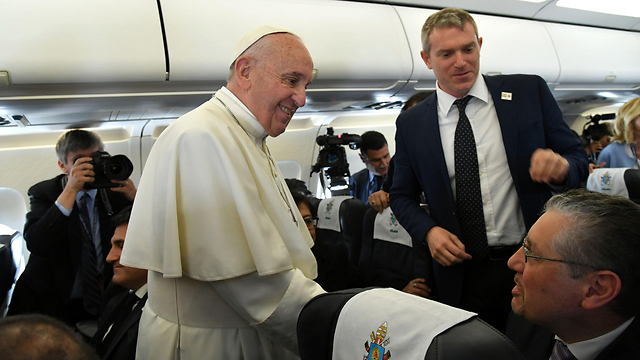 The pope on his flight to Egypt (Photo: AFP)
