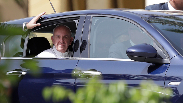 The pope in a low-key blue Fiat (Photo: AP)