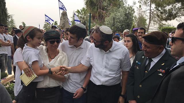 Eisenkot (R) greets the family of recently fallen soldier Elhai Taharlev