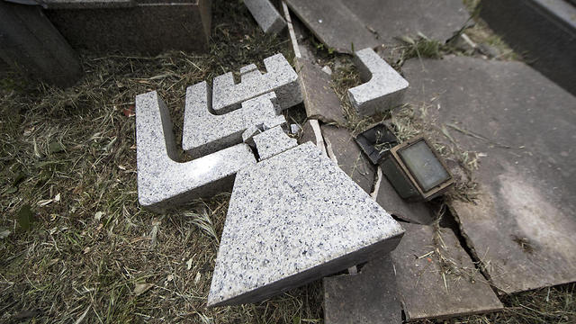 One of the desecared tombstones (Photo: EPA)