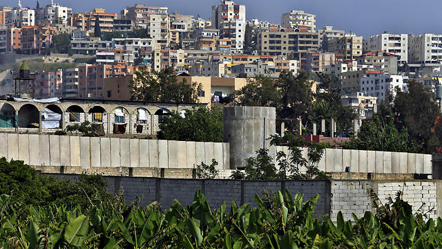 In this Friday, May 5, 2017 photo, a general view of the concrete wall surrounding the Ein el-Hilweh Palestinian refugee camp near the southern port city of Sidon, Lebanon. (Photo: AP) (Photo: AP)