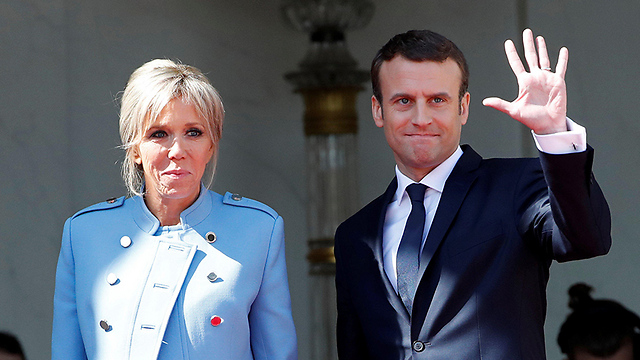 Macron and his wife Brigitte (Photo: Reuters) (Photo: AP)