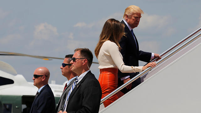 Donald and Melania Trump walking up to Air Force One (Photo: Reuters)