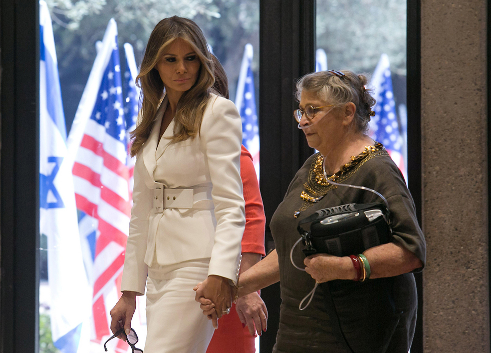 Melania Trump and Nechama Rivlin walk the red carpet hand in hand. The only genuine moment of the visit (Photo: Reuters) 