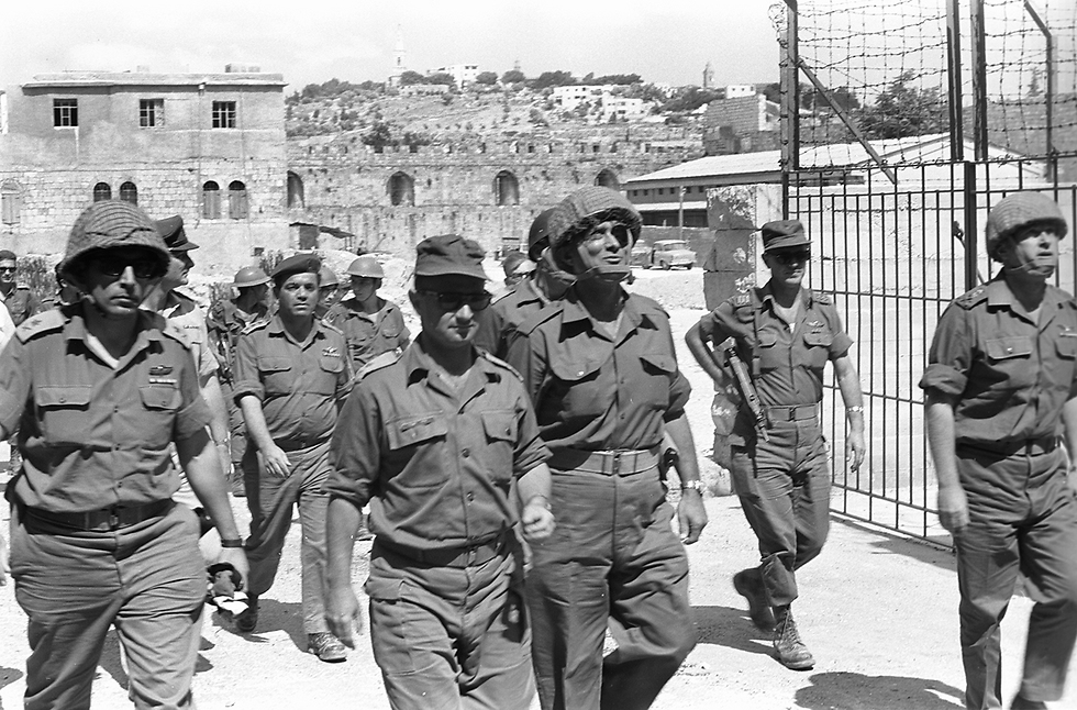 Chief of Staff Yitzhak Rabin, Defense Minister Moshe Dayan, Central Command chief Uzi Narkiss, Colonel Avraham Tamir and Major-General Rehavam Ze’evi arrive at the Old City of Jerusalem  
