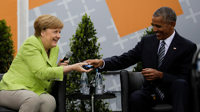 אובמה ומרקל בפגישה בברלין (צילום: AP) (צילום: AP)