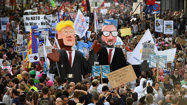 הפגנה נגד טראמפ בבריסל (צילום: AFP) (צילום: AFP)